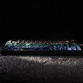 RGB backlit mechanical keyboard with cracked design on keys on textured surface